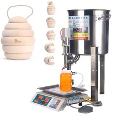 Automatic small honey honey filling machine manual sesame oil sesame sauce Yoghourt milk weighing liquid quantitative filling mac