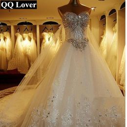 2020 New Luxury Big Train Wedding Dress Sexy Crystals Beaded Bridal Gown Custom made Plus Size Wedding Gown