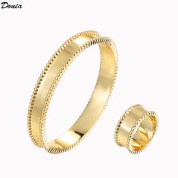 Donia jewelry luxury bangle party European and American fashion four-leaf clover glossy titanium steel designer bracelet ring set gift