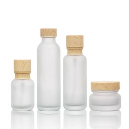 Frosted Glass Jar Lotion Cream Bottles Round Cosmetic Jars Hand Face Lotion Pump Bottle with wood grain cap LX3254