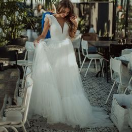 2021 Simple Style White Boho Wedding Dresses A Line Sexy Deep V Neck Backless Bride Dress Cheap Tulle Ruffles Beach Outdoor Bridal Gowns