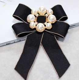 Provino di prodotti a base di perle con spilla bowknot di alta qualità per accessori per la moda da donna