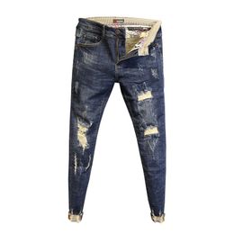 Whole 2020 Fashion No ironing low waist washing edge pants slim feet pants men's spring ripped holes ankle length jeans2358