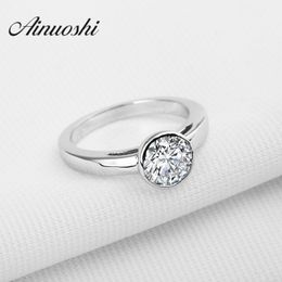 AINOUSHI 1.25 ct Round Cut Solitaire NSCD Wedding Ring 925 Sterling Silver Anelli Donna Women Wedding Engagement Ring Y200106