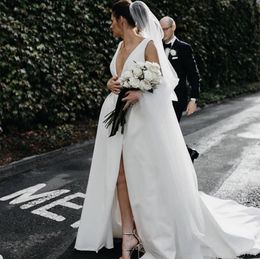 Simple Satin Country Wedding Dresses With Pockets Sexy Front Split Long Train Garden Bridal Gowns Deep V Neck Straps Outdoor Wedding Dress