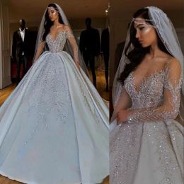 beaded plus size wedding dresses UK - 2022 Dubai Arabic Luxury A Line Wedding Dresses Formal Bride Dress JeweL Neck Illusion Sheer Crystal Beading Long Sleeves Satin Backless vestido Plus Size CG001