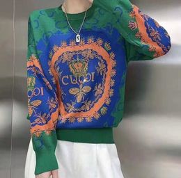 red cashmere cardigan sweater