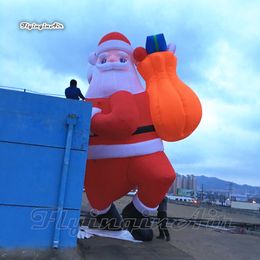 Giant Bearded Inflatable Santa Claus Model 6m Red Air Blown Santa Carrying A Gift Bag For Christmas Outdoor Decoration