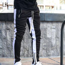 black tight tracksuit bottoms