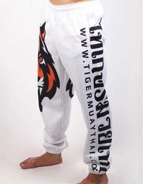 Men boxing sports fitness Tigter Muay Thai Personality Loose Large Size Thai Fist and Jogging Pants Running Fights Kickboxing 201126