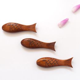 Creative small fish chopstick holder, cute wooden fashion tableware, new hand-carved chopstick holder
