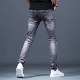 Adolescenti all'ingrosso Jeans da uomo ricamati con foro di marca da uomo estate sottile piedi sottili dritti pantaloni lunghi casual grigio fumo 201111