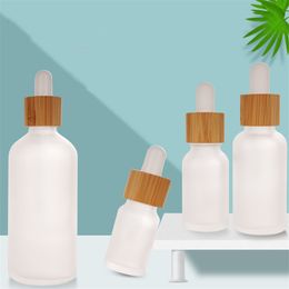 Frosted Clear Glass Dropper Bottle With Bamboo Lid Cosmetic Packaging Glasses Liquid Cosmetic Containers