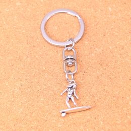 Fashion Keychain 21*18mm lady female surfer surfing Pendants DIY Jewellery Car Key Chain Ring Holder Souvenir For Gift