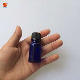 Wholesale 10ml Mini Blue Glass e Liquid Bottles with Black Cap Sealing up small Jars 24pcs/lot