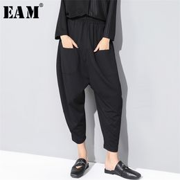 [EAM] 2020 New Spring Autumn High Elastic Waist Loose Black Pocket Split Joint Loose Harem Pants Women Trousers Fashion LJ201029