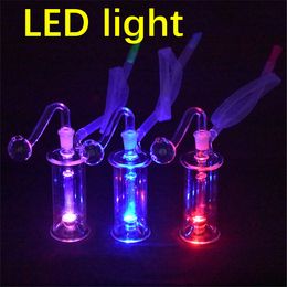 LED Glass Oil Burner Bong pyrex Glow in the dark small Bubbler Bong MiNi Oil Dab Rigs for Smoking Hookahs with 10mm glass oil burner pipe