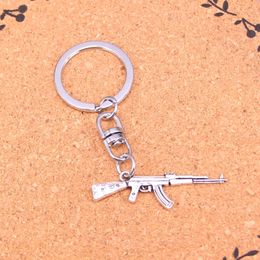 Fashion Keychain 44*15mm machine gun assault rifle ak-47 Pendants DIY Jewellery Car Key Chain Ring Holder Souvenir For Gift