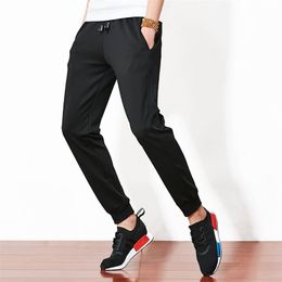 Men Plus Size Pants Solid Baggy Loose Elastic Pants 2020 Sweatpants Casual Pants Trousers Large Big Plus Size LJ201104