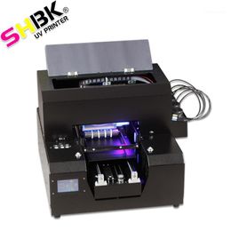 Impresora automática A4 UV de Shbk para caja de teléfono de botella de cilindro impresora portátil de mano de mano para el paquete de plástico de vidrio de madera1