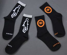 Three pairs of shadow alien orange eyes cotton sports tube Street trend socks for men and women
