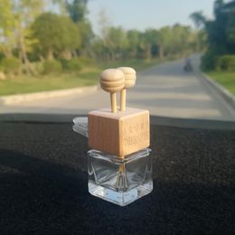 Hot Selling Car Scenter Empty Bottle Air Freshener Decoration Essential Oil Perfume Hanging Glass Diffuser Bottles with Candy Wooden Lids