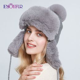 ENJOYFUR Bomber hats for women winter warm knitted caps with ear flap faux rabbit fur beanies with pom pom Y200102