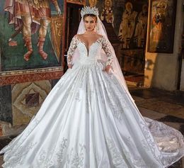 2023 Luxury Ball Gown Wedding Dresses Jewel Neck Illusion Lace Appliqued Long Sleeves Crystal Beads Bridal Gowns Custom Made Robe De Mariee Open Back