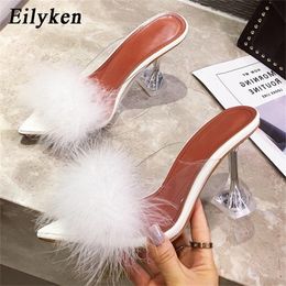 Eilyken New Design White Fluffy Pointed Toe Womens Slippers PVC Transparent Jelly Sandals Perspex Glass Spike Heels Shoes Pumps Y200423