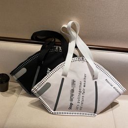 Design kreativa masker form axelväska stor kapacitet mode miljöskydd handväska kläder lagringsäckar gåvor LJJK2509