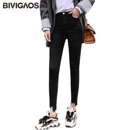 BIVIGAOS Women Irregular Hem Slim Elastic Jeans Pencil Pants Korean Magic Pants Leggings Button Zipper Black Skinny Pants 201030