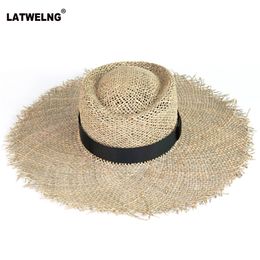 Wholesale Women Sea Straw Sun Hat With Black Belt Fashionable Hollow Summer Beach Hats Breathable Wide Brim UV Hat With Bow Y200602