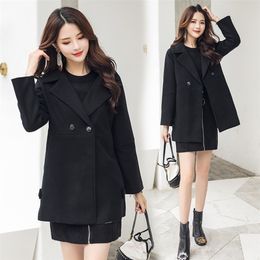 Black cloth coat winter new han edition dress in long loose wool coat type cocoon coat 201216