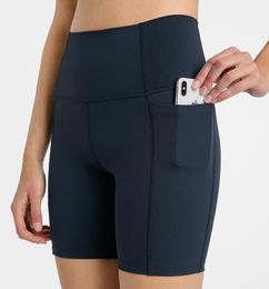 Vår och sommar nya multipanel sidfickor sportkvartsbyxor dam hög midja höftlyftande elastiska tighta Fitness Yoga-shorts