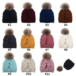 Wholesale-Cross Pom Pom Beanies Skull Ponytail Beanies 11 Colours Winter Warm Knitted Hat Women Ski Cap CYZ2843