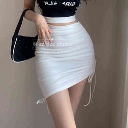 WOMENGAGA Spring New High Waist Irregular Bandage Elastic Thin Sexy Mini Skirt Skinny Hot Sexy Drawstring Korean Women 243M G220309