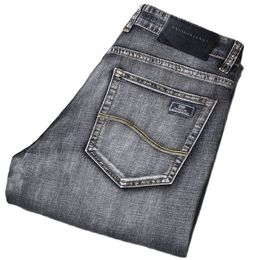 Jeans grigi classici da uomo primavera estate Jeans sottili elasticizzati da uomo elasticizzati Business Casual Stile classico 220311