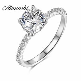 AINUOSHI Luxury 1.25 Carat Round Cut Engagement Rings 4 Claw 925 Sterling Silver Wedding Bijoux for Women Romantic Birthday Gift Y200106