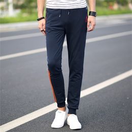 5XL Mens Casual Pants Cotton Sweatpants Men Joggers Striped Pants Gyms Loose Sweat Pants Bodybuilding Tracksuit Bottoms Elastic 201222