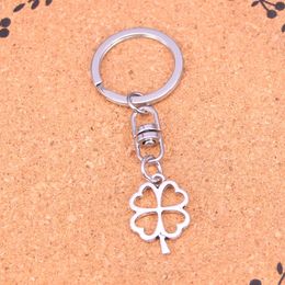 Fashion Keychain 24*17mm hollow lucky four leaf clover irish Pendants DIY Jewelry Car Key Chain Ring Holder Souvenir For Gift