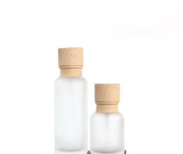 2021 Frosted Glass Cream Jar with Wood Grain Plastic Cap 50ML/110ML/150ML Lotion Pump Bottles Cosmetic Pot Container