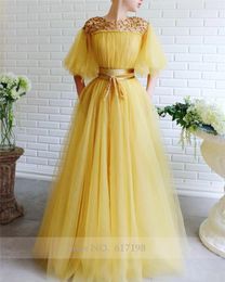 -Cap-Ärmeln mit goldenen Paillettenabend-Perlen A-line Gelb-Abschlussball-Kleid Vestidos de Fiesta-Largos Elegantes de Gala Vestidos de Fiesta