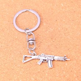 Fashion Keychain 45*13mm machine gun assault rifle Pendants DIY Jewellery Car Key Chain Ring Holder Souvenir For Gift