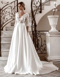 Elegant Half Sleeve Lace Wedding Dresses Deep V Neck Appliqued Ivory Long Satin Bridal Gowns Vestidos De Novia Court Train Illusion Top