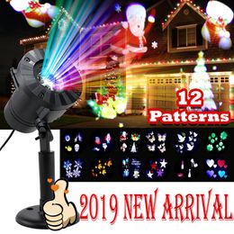 12 Patterns Halloween Christmas outdoor Waterproof LED Laser Projector Snowflake dj Disco Light For Home Decoration Y201006