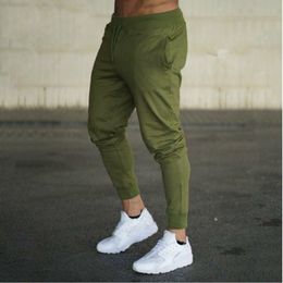 Fashion New Men Joggers Brand Male Trousers Casual Pants Sweatpants Jogger grey Casual Elastic cotton GYMS Fitness Workout pan WE