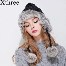 Xthree ear flaps winter bomber hat for women rabbit fur knitting hat girl warm solid color cap cozy bonnet caps Y200110