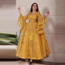 2021 Ankle Length Glitter Gold Prom Dresses Long Bell Sleeves Appliqued Sequins Sparkly Plus Size V Neck Arabic Dubai Formal Evening Gowns