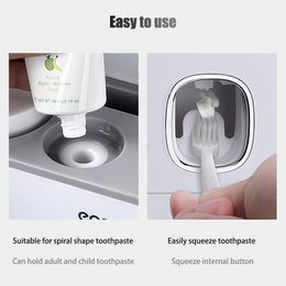 GESEW Magnetic Toothbrush Holder Bathroom Automatic Toothpaste Dispenser Wall Paste Toothpaste squeezer Bathroom Accessories Set LJ201204