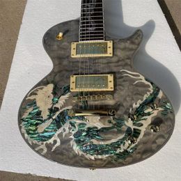 Dragon shaped 6-string electric guitar, dragon pattern color shell inlaid with yellow hardware, black side